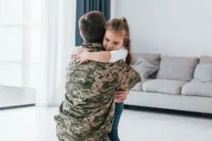 embracing-each-other-soldier-in-uniform-is-at-hom-