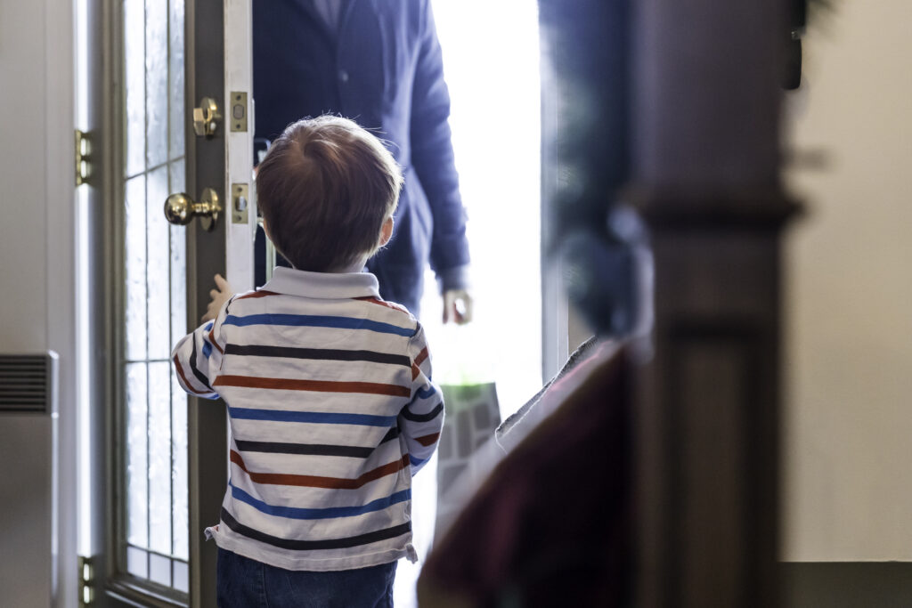 Child Opening Door